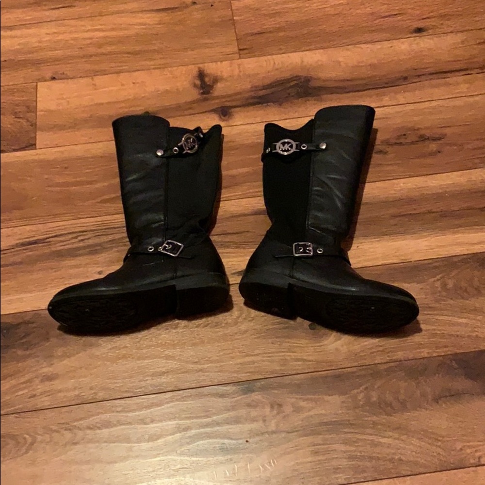 Black Michael Kors boots.